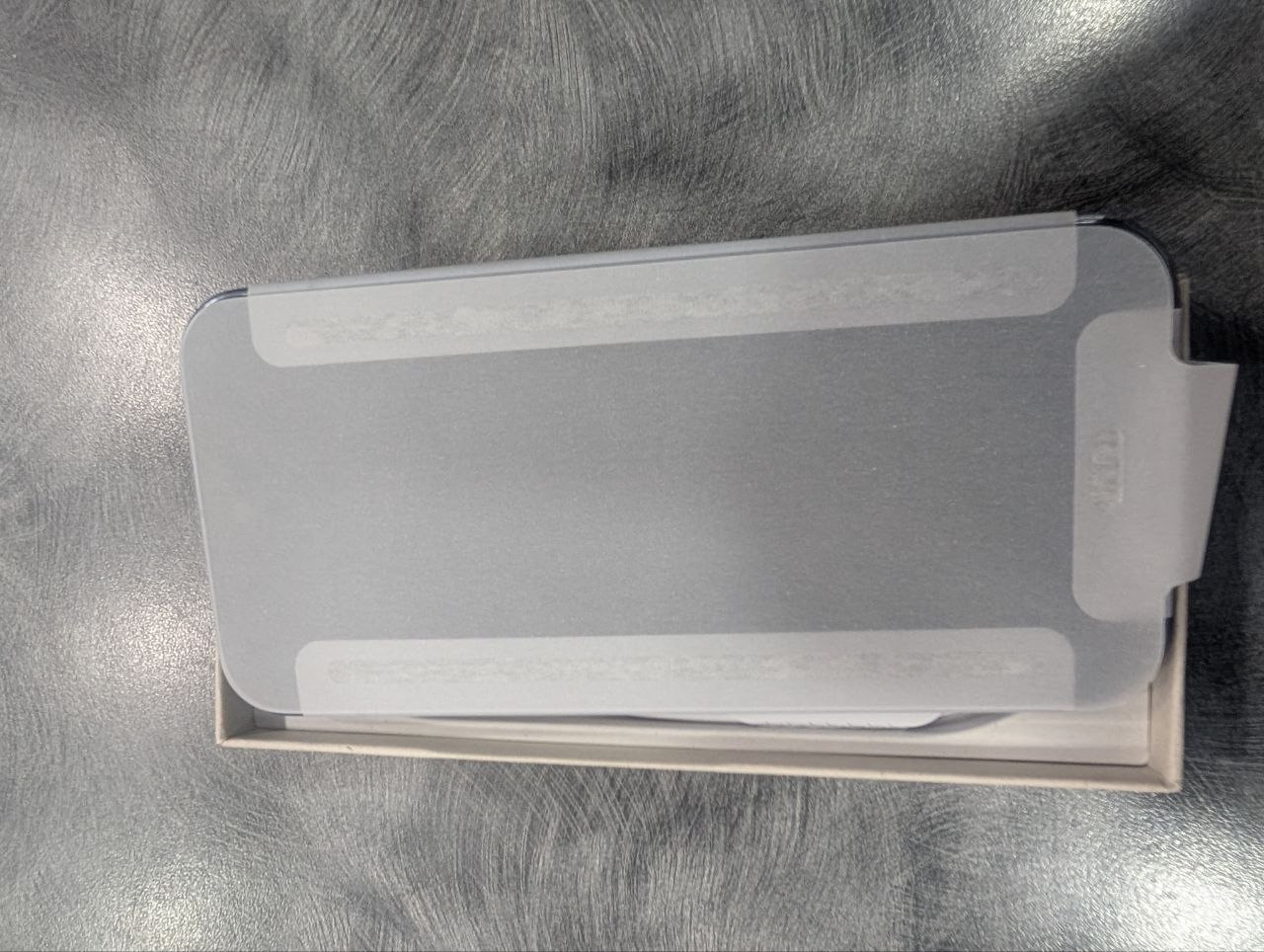 Google Pixel 10 Pro 128GB open box showing phone with protective film